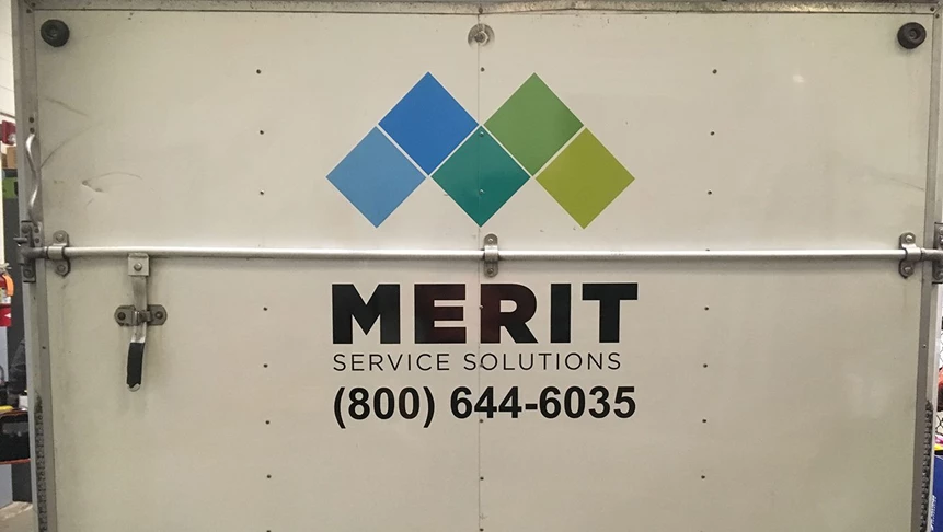 Rear trailer graphics for Merit Service Solutions