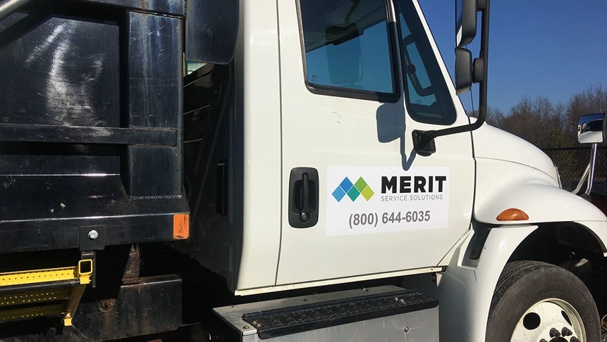 Temporary vehicle graphics for Merit Service Solutions and their new fleet of trucks for the winter.
