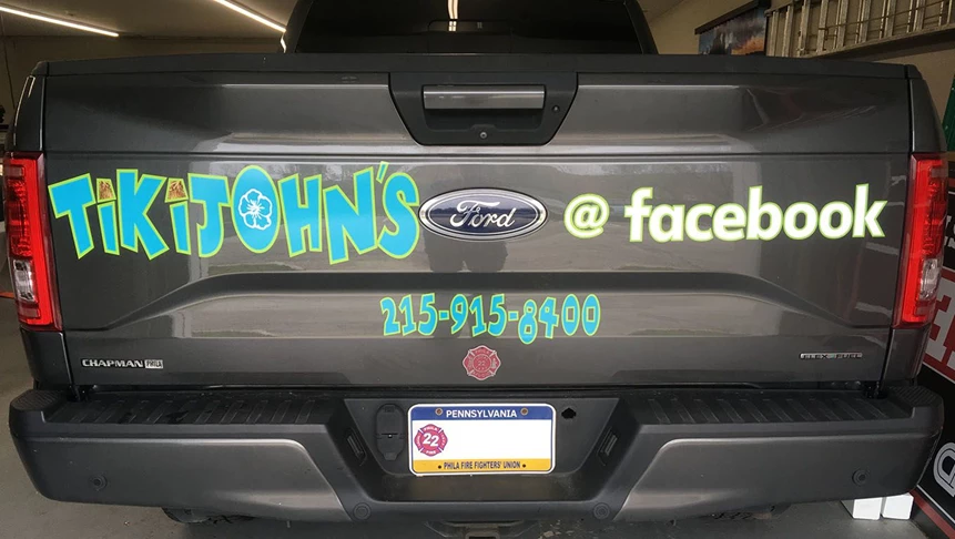 Our client John wanted custom decals for his truck to promote his Tiki business.