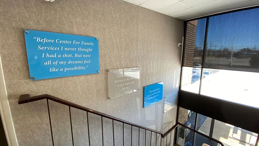 Acrylic and vinyl were used to create these stairwell signs quoting client reviews.