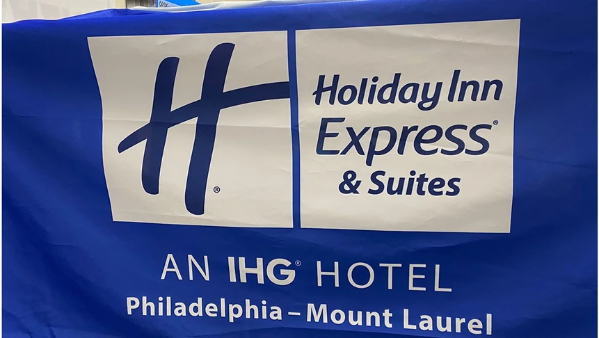 Fabric table throw for Holiday Inn Express Mt. Laurel. The company updated their logo and the hotel needed a new table throw.