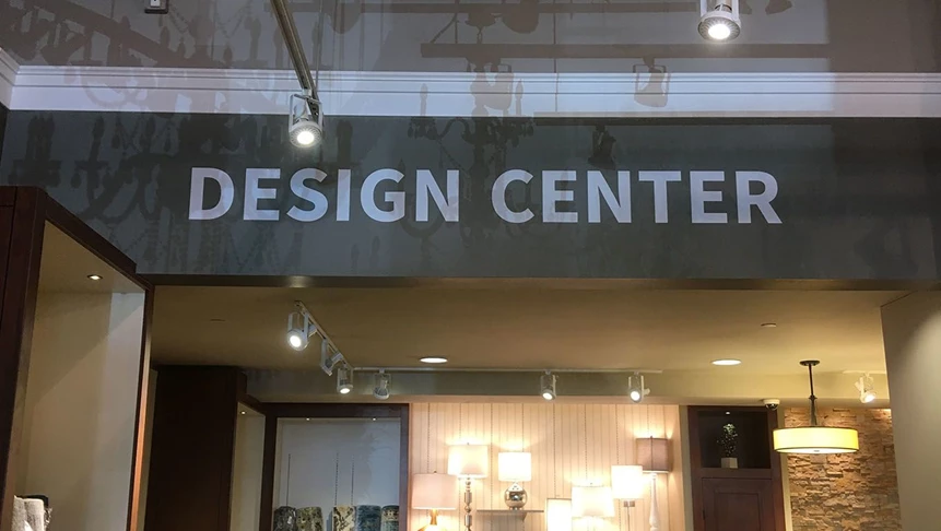 Vinyl lettering designating Monroe & Kents design center inside their Marlton retail location.