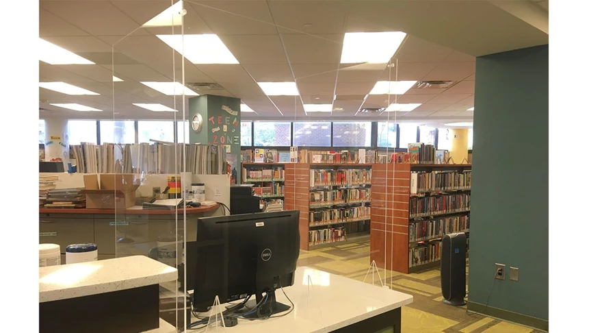 Rutgers Camden library had acrylic barriers installed at their checkout area.