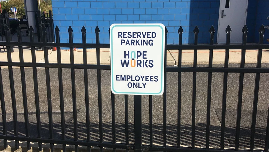 Parking for employees only sign for our client Antebi Properties.